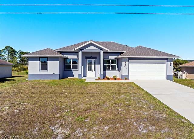 Property at 3712 21st St SW, Lehigh Acres, FL 33976, 4 beds, 3 baths