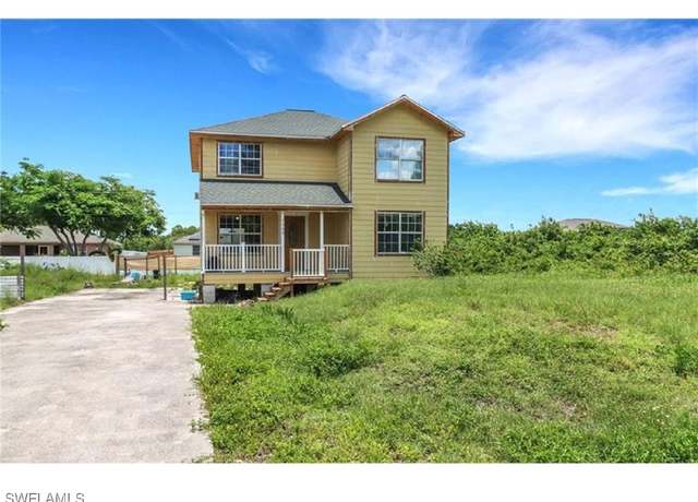 Property at 3906 28th St SW, Lehigh Acres, FL 33976, 4 beds, 3 baths