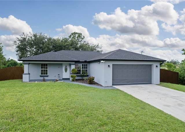 Property at 2701 8th St SW, Lehigh Acres, FL 33976, 3 beds, 2 baths
