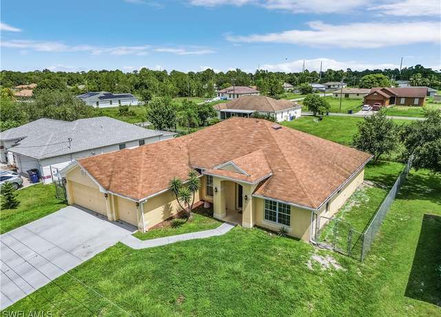 Property at 3916 4th St SW, Lehigh Acres, FL 33976, 4 beds, 3 baths