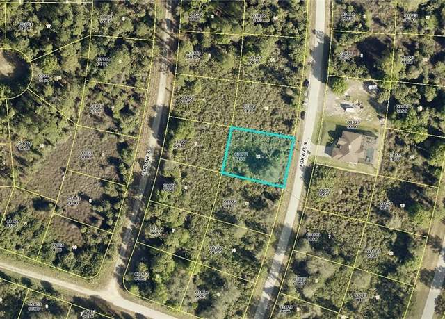 Property at 128 Fox Ave S, Lehigh Acres, FL 33974