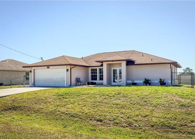 Property at 3911 9th St SW, Lehigh Acres, FL 33976, 4 beds, 3 baths