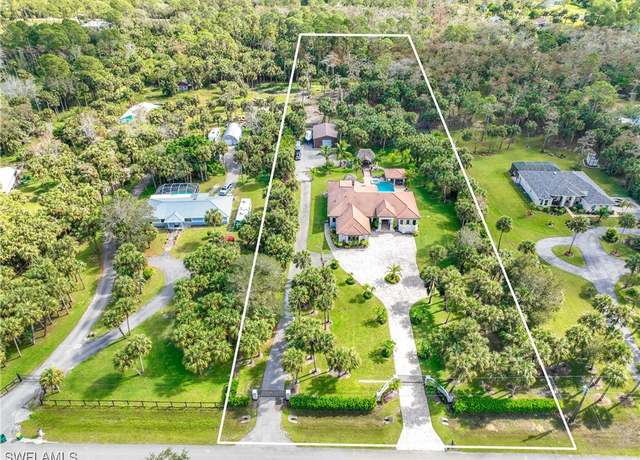 Property at 214 9th St NW, Naples, FL 34120, 4 beds, 3.5 baths