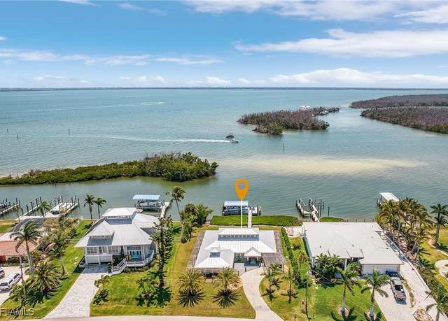 Property at 3695 San Carlos Dr, St. James City, FL 33956, 3 beds, 2 baths
