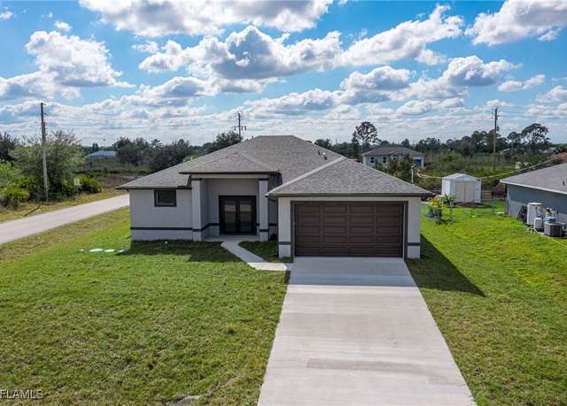 Property at 2801 69th St W, Lehigh Acres, FL 33971, 3 beds, 2 baths