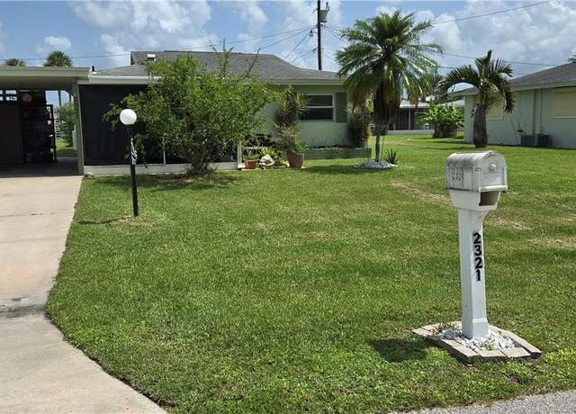 Property at 2321 Orange St, Lehigh Acres, FL 33936, 2 beds, 2 baths