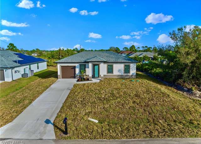 Property at 3204 15th St SW, Lehigh Acres, FL 33976, 3 beds, 3 baths