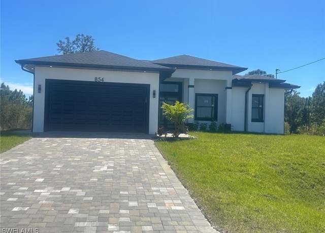 Property at 2905 E 18th St, Lehigh Acres, FL 33972, 4 beds, 2 baths