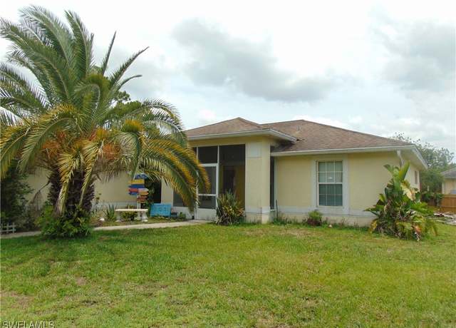 Property at 705 W 6th St, Lehigh Acres, FL 33972, 3 beds, 2 baths