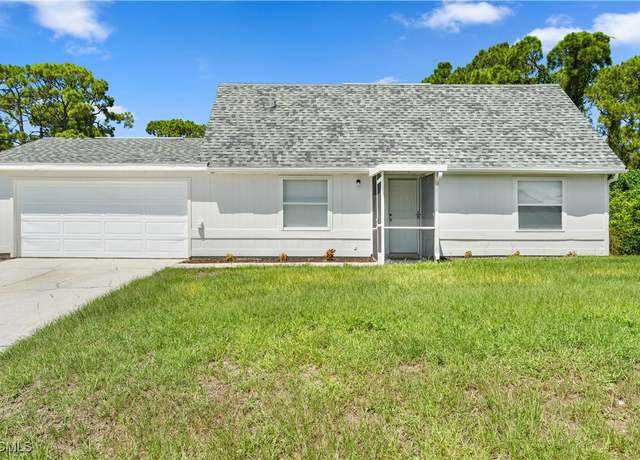 Property at 205 James Ave N, Lehigh Acres, FL 33971, 3 beds, 2 baths