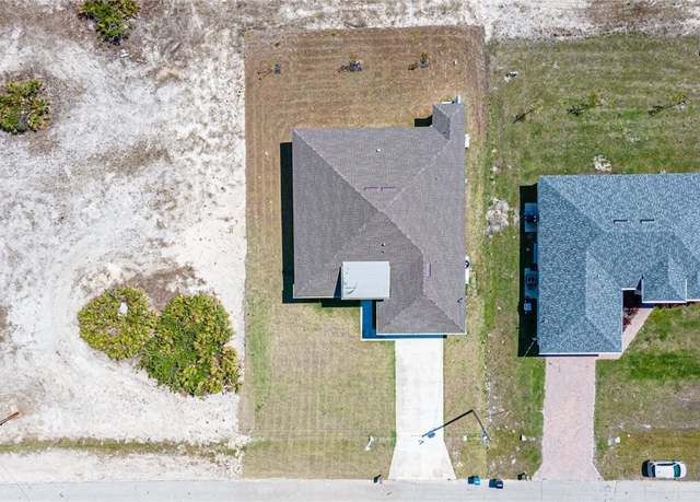 Property at 2458 NW 21st Ter, Cape Coral, FL 33993, 3 beds, 3.5 baths