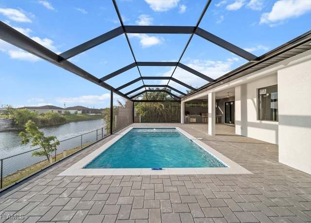 Property at 2102 NE 1st Pl, Cape Coral, FL 33909, 3 beds, 3 baths