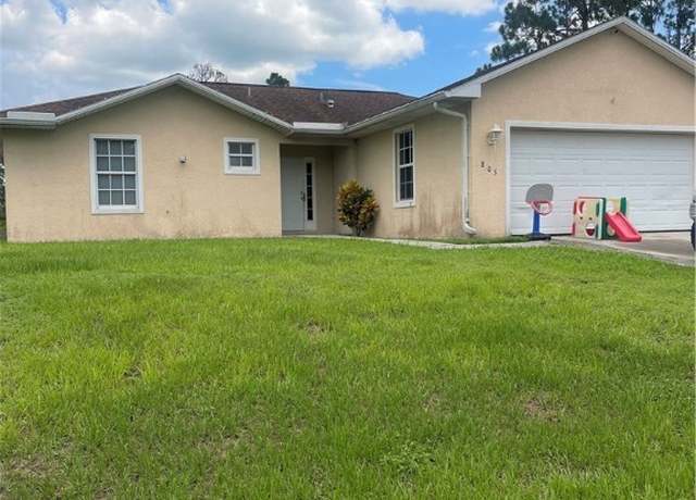 Property at 805 Puccini Ave S, Lehigh Acres, FL 33974, 3 beds, 2 baths