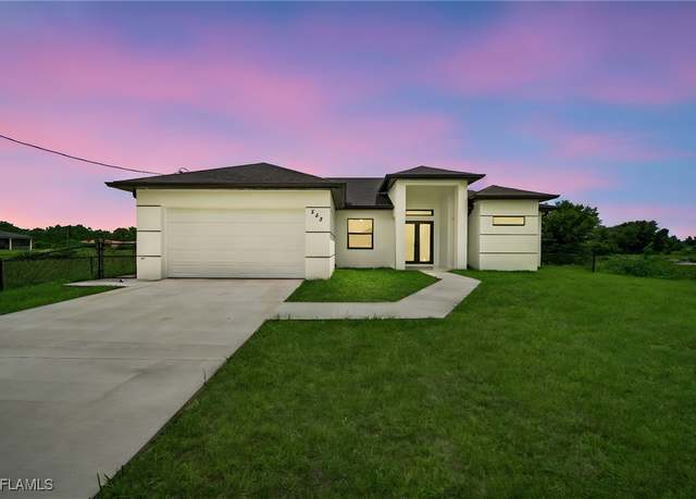 Property at 542 Raintree St E, Lehigh Acres, FL 33974, 3 beds, 2 baths
