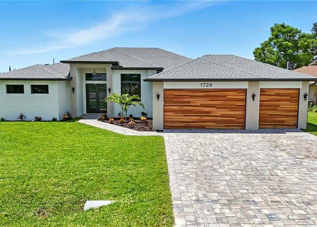 Property at 1726 SW 15th Ave, Cape Coral, FL 33991, 4 beds, 3 baths
