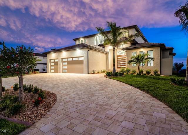 Property at 1024 Dolphin Dr, Cape Coral, FL 33904, 5 beds, 4.5 baths