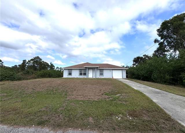 Property at 219 Portia St, Lehigh Acres, FL 33974, 4 beds, 2 baths