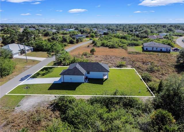 Property at 312 Progress Ave, Lehigh Acres, FL 33974, 3 beds, 2 baths