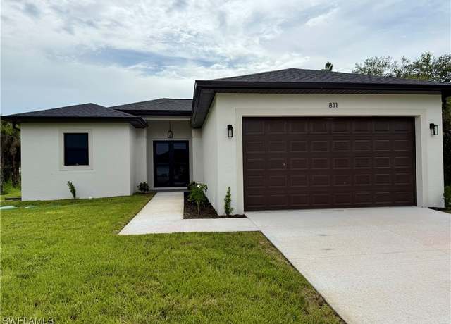 Property at 811 Thompson Ave, Lehigh Acres, FL 33972, 3 beds, 2 baths