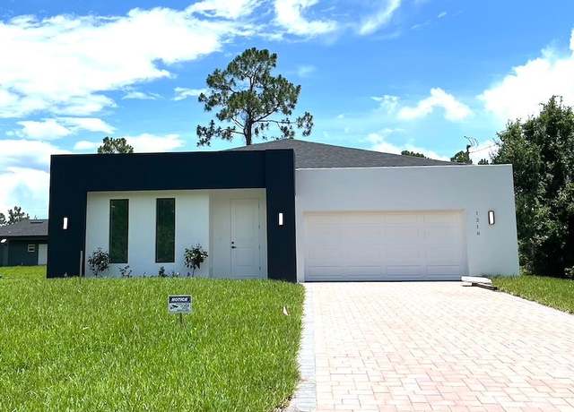 Property at 1218 Eclat St E, Lehigh Acres, FL 33974, 3 beds, 2 baths