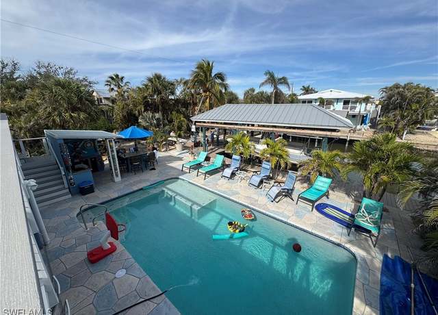 Property at 320 Lazy Way, Fort Myers Beach, FL 33931, 5 beds, 4 baths