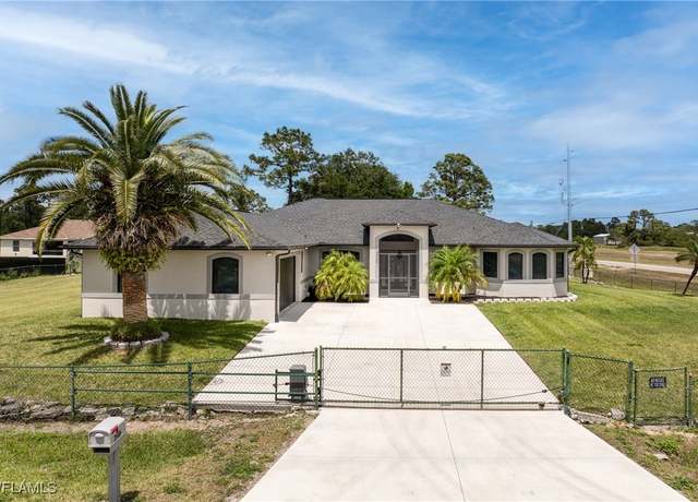 Property at 2500 50th St W, Lehigh Acres, FL 33971, 4 beds, 3 baths