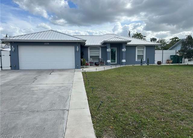 Property at 5376 20th Pl SW, Naples, FL 34116, 4 beds, 3.5 baths