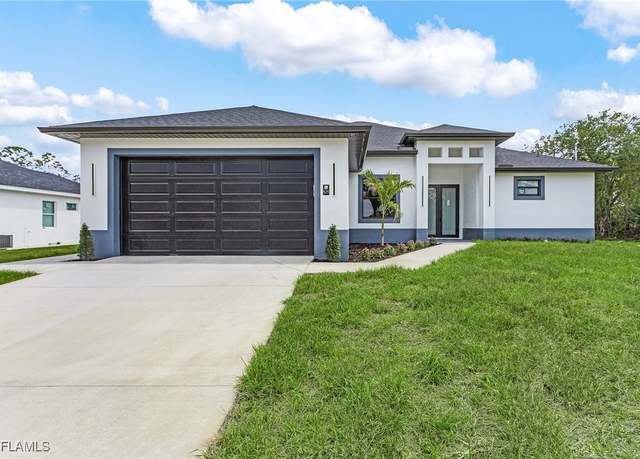 Property at 634 Raintree St E, Lehigh Acres, FL 33974, 3 beds, 2 baths