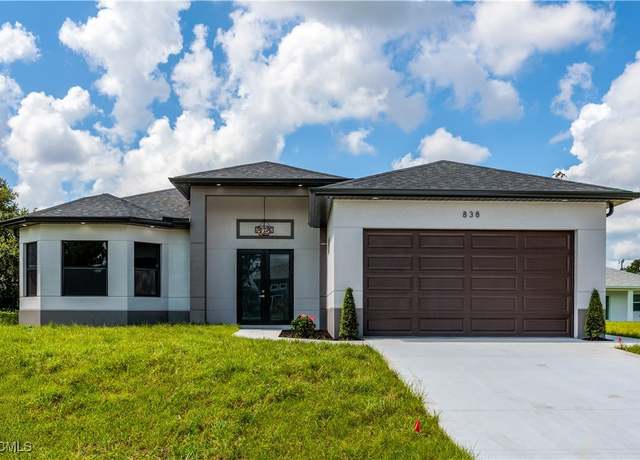 Property at 838 Chantilly St E, Lehigh Acres, FL 33974, 4 beds, 2 baths