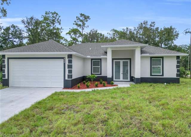 Property at 900 W 15th St, Lehigh Acres, FL 33972, 3 beds, 2 baths