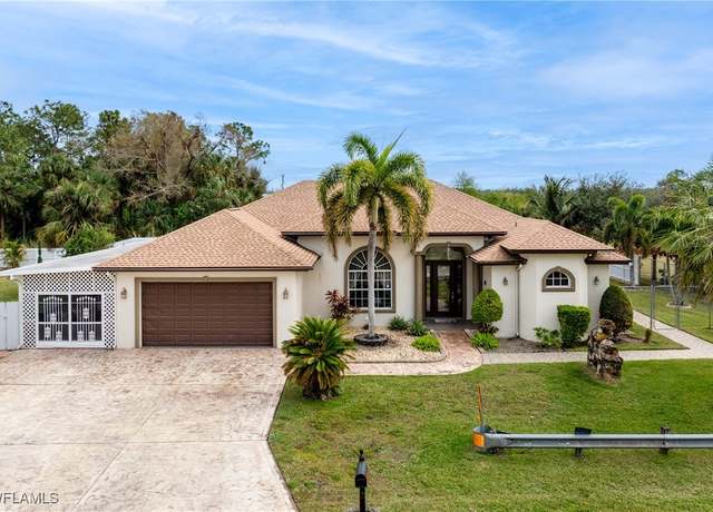 Property at 1300 Connie Ave N, Lehigh Acres, FL 33971, 4 beds, 3 baths
