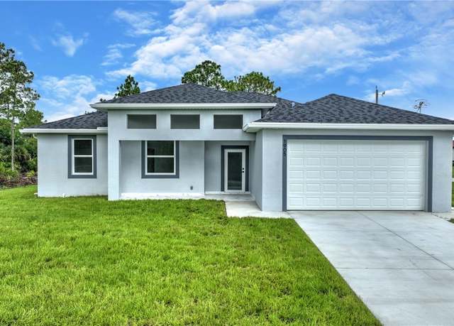 Property at 1905 Charles Ave N, Lehigh Acres, FL 33971, 4 beds, 3 baths