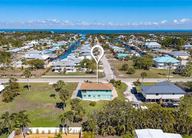 Property at 7431 Barrancas Ave, Bokeelia, FL 33922, 3 beds, 2 baths