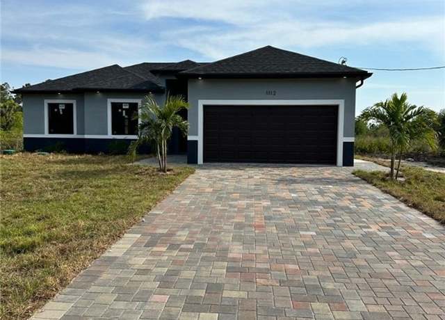 Property at 1112 Sentinela Blvd E, Lehigh Acres, FL 33974, 3 beds, 2 baths