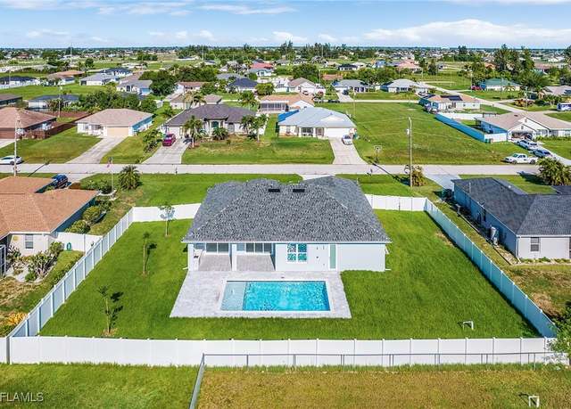 Property at 1715 NE 2nd Pl, Cape Coral, FL 33909, 4 beds, 2.5 baths