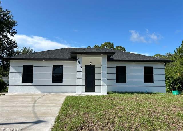 Property at 2815 4th St SW, Lehigh Acres, FL 33976, 4 beds, 3 baths
