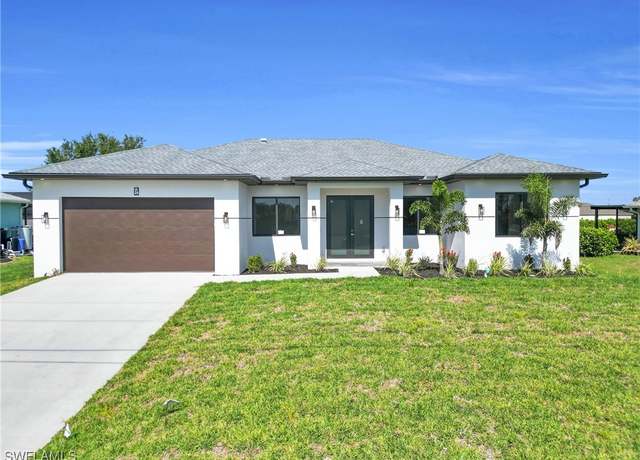 Property at 24 NW 21st Ave, Cape Coral, FL 33993, 4 beds, 3 baths
