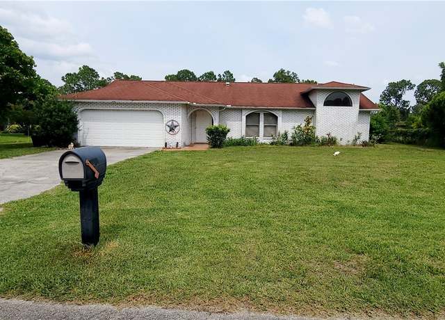 Property at 404 Roosevelt Ave, Lehigh Acres, FL 33936, 4 beds, 2 baths