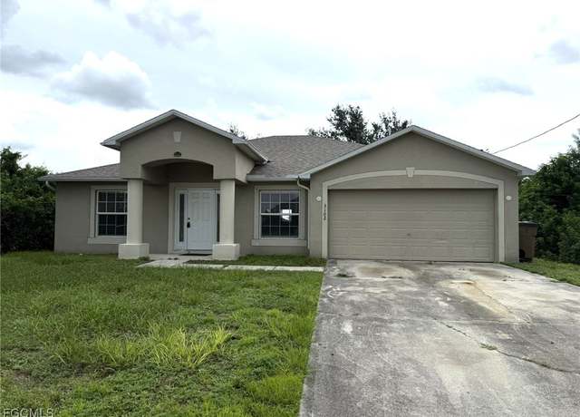Property at 3102 27th St SW, Lehigh Acres, FL 33976, 3 beds, 2 baths