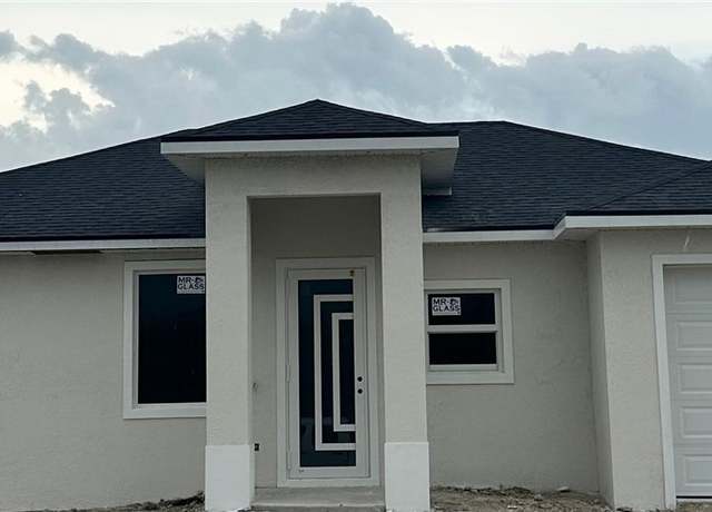 Property at 1075 Barnett St E, Lehigh Acres, FL 33974, 3 beds, 2 baths
