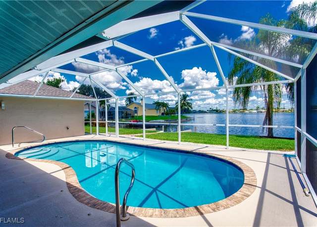 Property at 911 SW 3rd Ave, Cape Coral, FL 33991, 4 beds, 3 baths