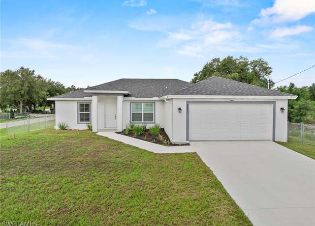Property at 2801 50th St SW, Lehigh Acres, FL 33976, 3 beds, 2 baths