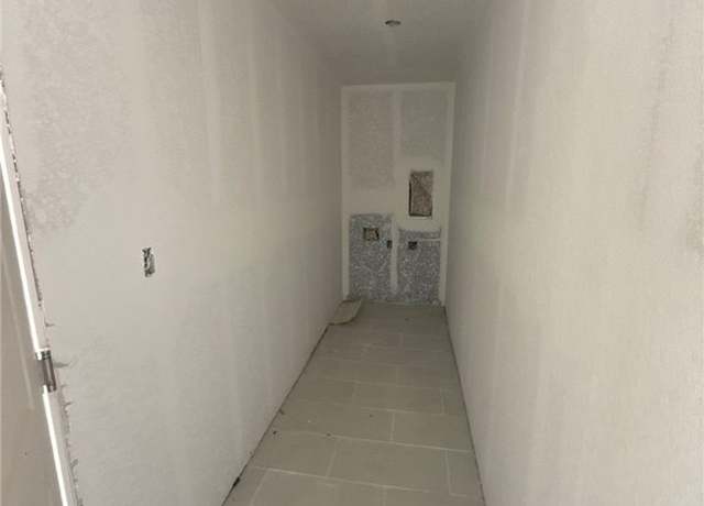 Property at 1614 NE 6th Ave, Cape Coral, FL 33909, 4 beds, 3 baths