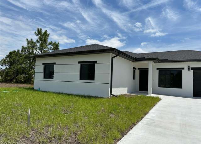 Property at 901 Oxford Ave S, Lehigh Acres, FL 33974, 3 beds, 2 baths