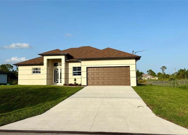 Property at 1312 Oak Ave, Lehigh Acres, FL 33972, 4 beds, 3 baths