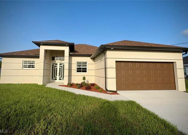 Property at 1312 Oak Ave, Lehigh Acres, FL 33972, 4 beds, 3 baths