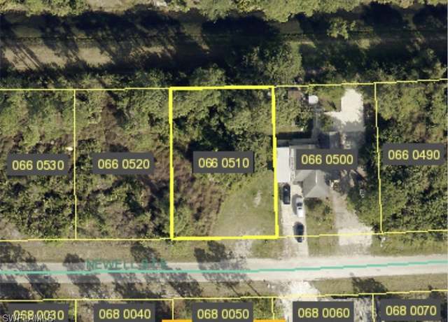 Property at 715 Newell St E, Lehigh Acres, FL 33974