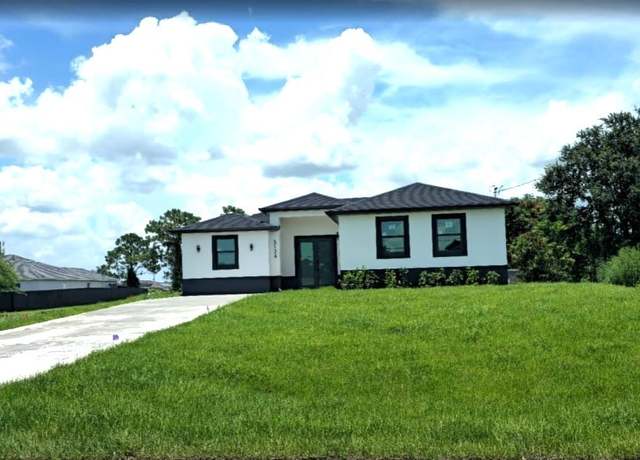 Property at 3124 40th St SW, Lehigh Acres, FL 33976, 3 beds, 2 baths