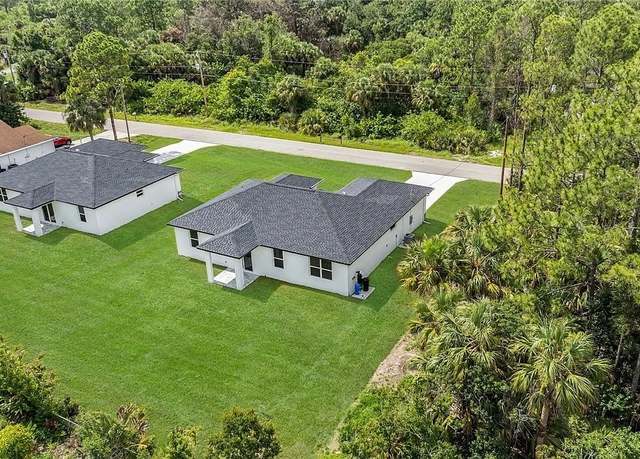 Property at 3015 26th St W, Lehigh Acres, FL 33971, 3 beds, 2 baths