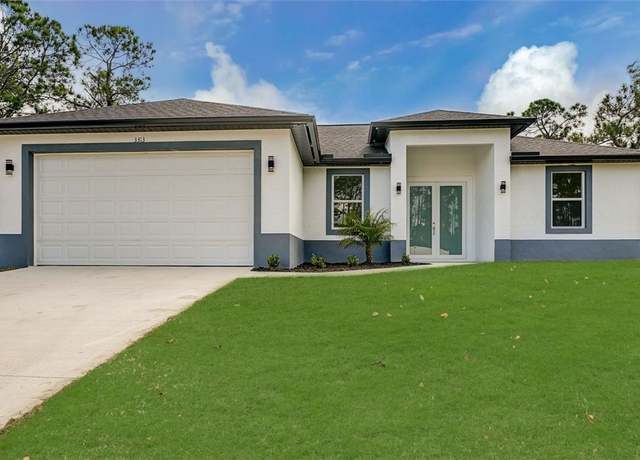 Property at 2702 11th St W, Lehigh Acres, FL 33971, 3 beds, 2 baths